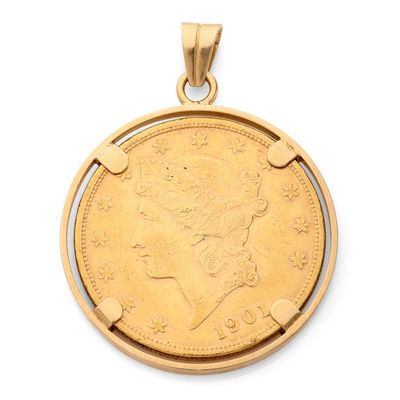 une image représentant un pendentif en forme de pièce d'or sur lequel est gravé le visage d'une femme