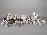 many different types of figurines displayed on the table