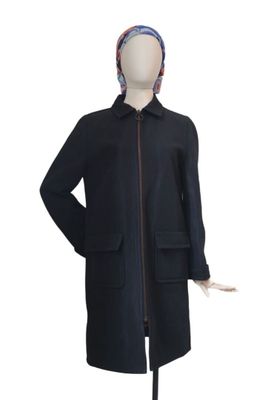 black coat with hood and zippers on mannequin mannequin mannequin mannequin mannequin mannequin mannequin mannequin