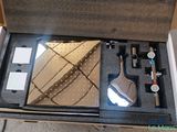 a box with a set of tools inside of it