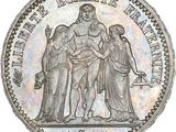 a close up of a coin with a man and a woman on it