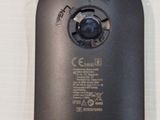 a close up of a computer mouse on a white surface