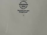 a white plate with a black and white design on it