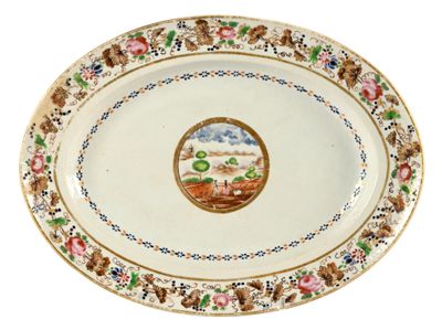 une assiette sur laquelle est représenté un paysage