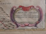 an old map of the region of saint - savoie, with mountains in the background