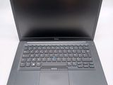 the laptop is open and ready to be used on the desk
