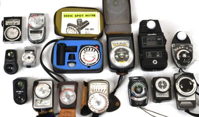 many different types of electronic devices on a white surface