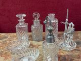 a lot of glass items on a table with a red background