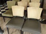 many chairs that are lined up in a waiting room