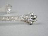 silver plated bracelet with a lion ' s paw on the side
