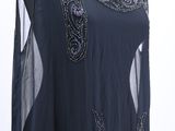 a woman ' s dress on a mannequin mannequin mannequin mannequin mannequin mannequin mannequin mannequin mann