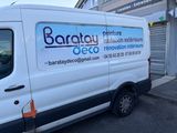 a van that is parked on the side of the street
