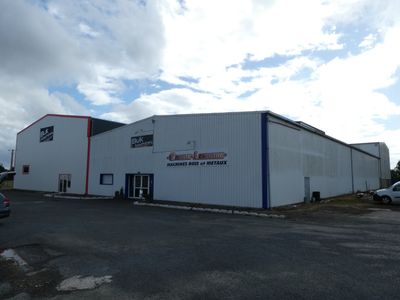 the building is white with blue trim and red trim