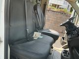 a seat in the back of a van that is empty