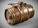 an old copper barrel with a handle on a gray background