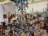 a chandelier that is hanging from the ceiling in a room
