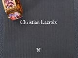 une photo d'une bague Christian Lacroix et d'un écrin