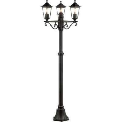 a black lamp post with three lanterns on top of it