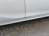 a car that has a sticker on the side of it