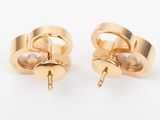 a pair of yellow gold earrings with pearls