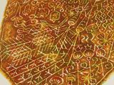 a picture of a drawing of a pizza on a table