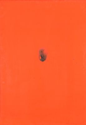 un carré orange avec un petit trou au milieu