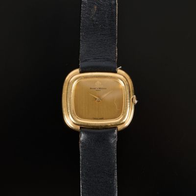 BAUME ET MERCIER. Bracelet-montre de dame en or, le cadran t… - Photo 1