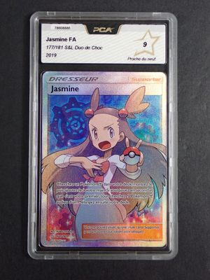a close up of a card on a table with a black background