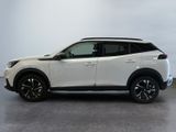 the white nissan rav is parked in a large room
