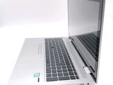 a laptop computer that is open and sitting on a table