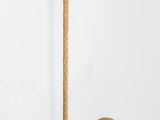 a rope that is sitting on top of a white surface