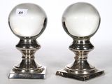 pair of silver plated salt and pepper shakers on stands