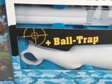 a box with a gun and a video game in it
