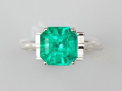 an emerald and diamond ring