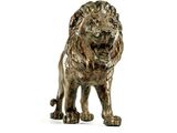 a statue of a lion that is standing on a white surface
