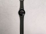 a watch that is laying on a table