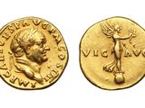 a gold coin with an image of a man on it