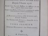 an old book with a black and white title on it