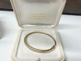 a close up of a box with a ring inside of it