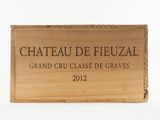 a wooden box with a sign that says chateau de fieuzall