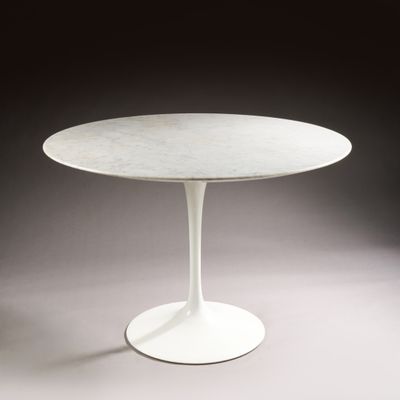 an image of a white table with a marble top on a grey background