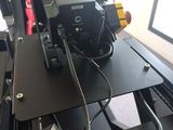 an image of a computer desk with a lot of wires
