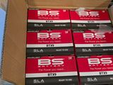several boxes of b5s are stacked on top of each other in a box