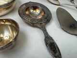 many spoons and spoons on the table together