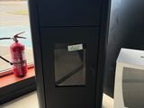 a microwave sitting next to a box on the floor