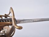 a person holding a sword in their hand