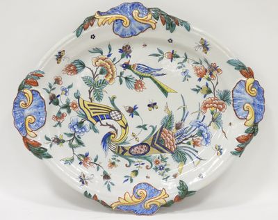 an image of a decorative plate with birds and flowers on it