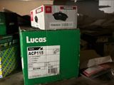many boxes that are sitting on a shelf in a room