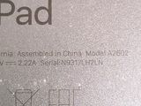 a close up of the back of a silver apple ipad