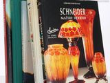 three books that are sitting next to each other on a table